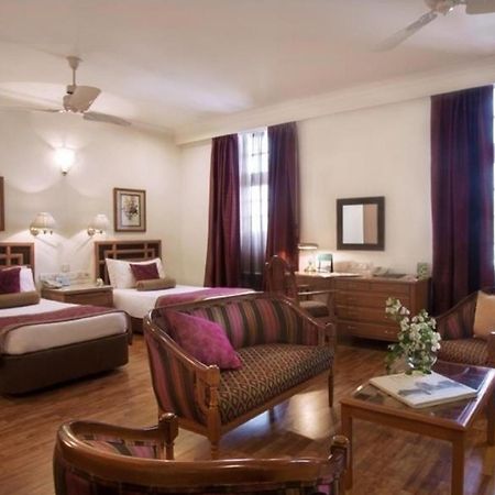 Отель Ambassador, New Delhi - Ihcl Seleqtions Экстерьер фото A suite at the Imperial Hotel