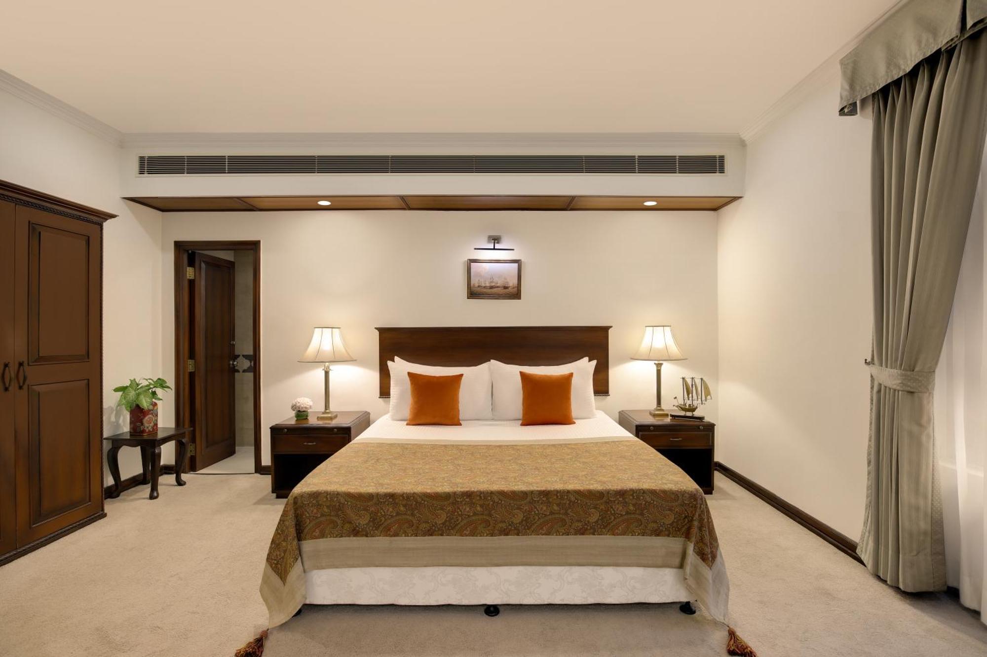 Отель Ambassador, New Delhi - Ihcl Seleqtions Экстерьер фото A bedroom at the Taj Bengal
